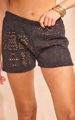 Online PrettyLittleThing Distressed Textured Rib High Waisted Hot Pants Black