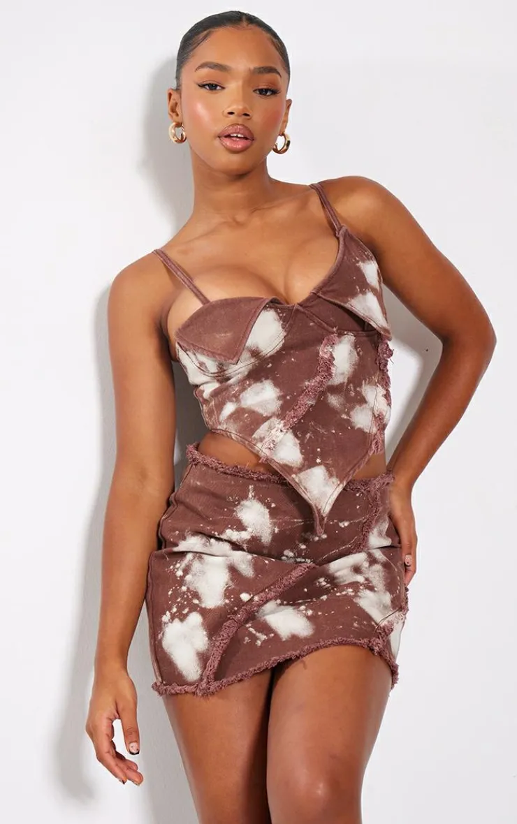 Online PrettyLittleThing Splatter Fray Asymmetric Hem Denim Crop Top Brown