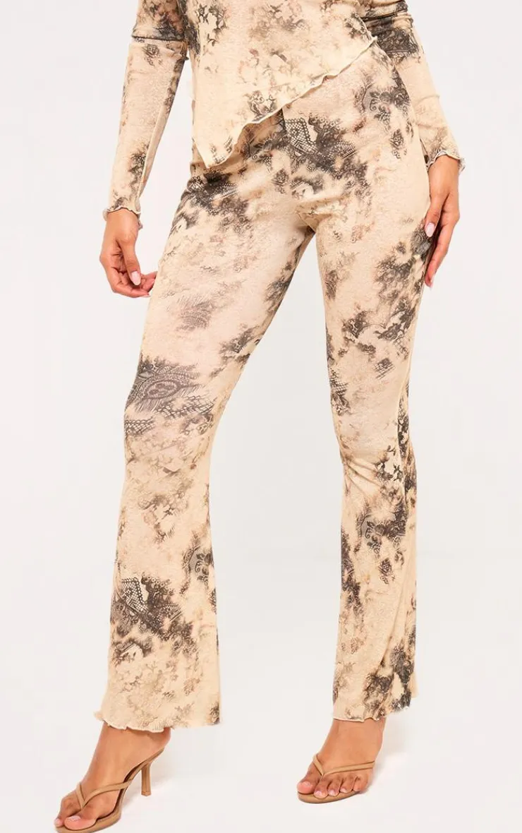 Online PrettyLittleThing Onion Skin Printed Hem Detail Flared Pants Cream