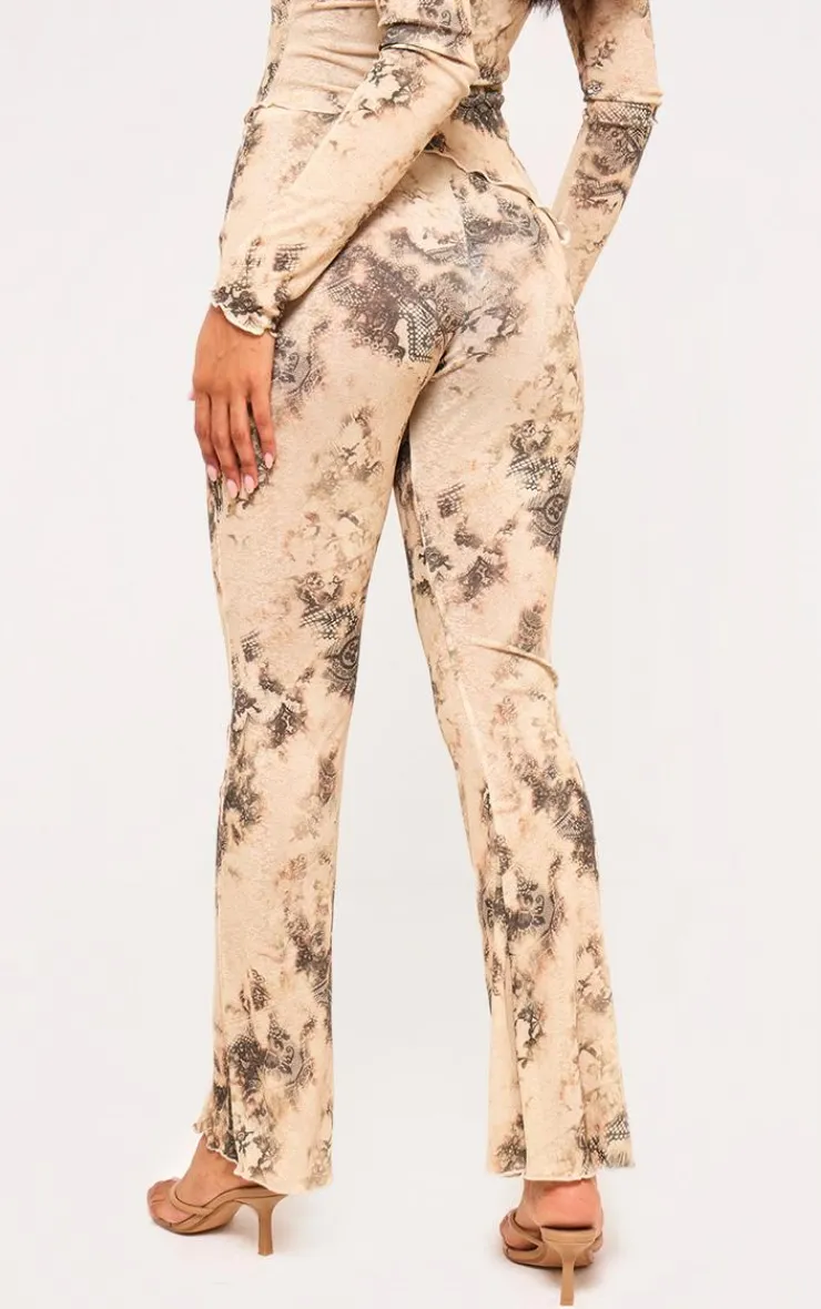 Online PrettyLittleThing Onion Skin Printed Hem Detail Flared Pants Cream
