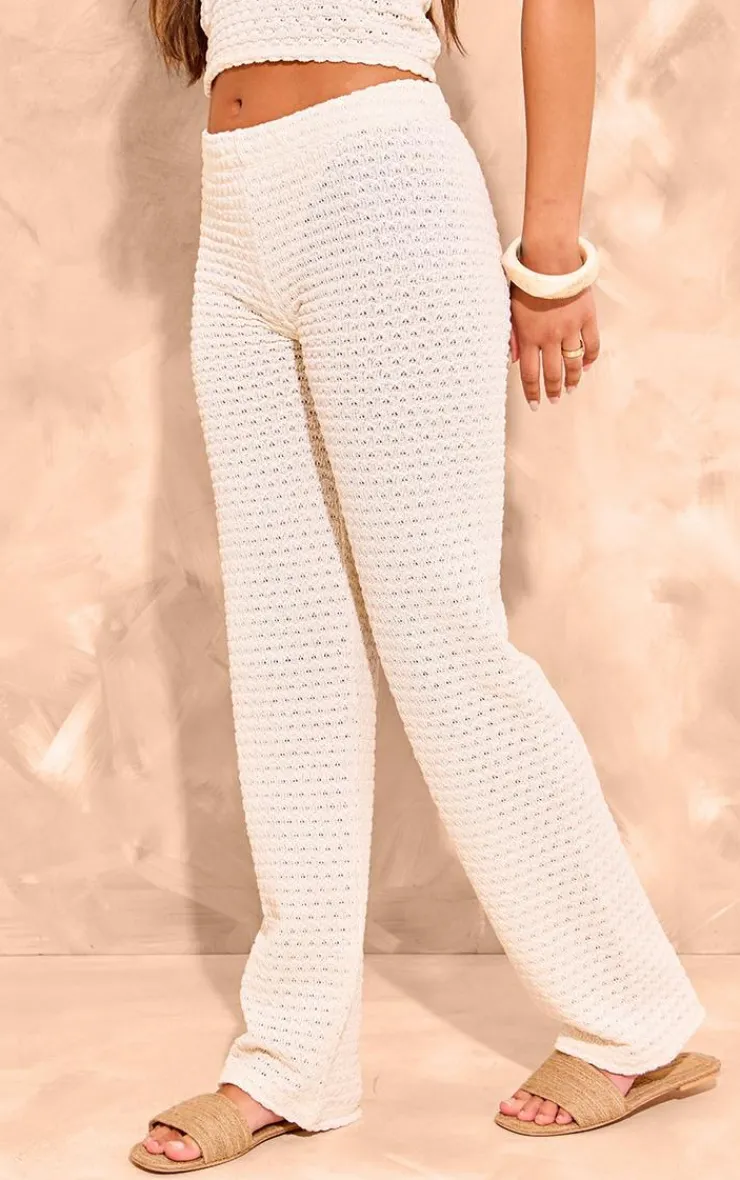 Online PrettyLittleThing Textured Rib Flare Pants Cream