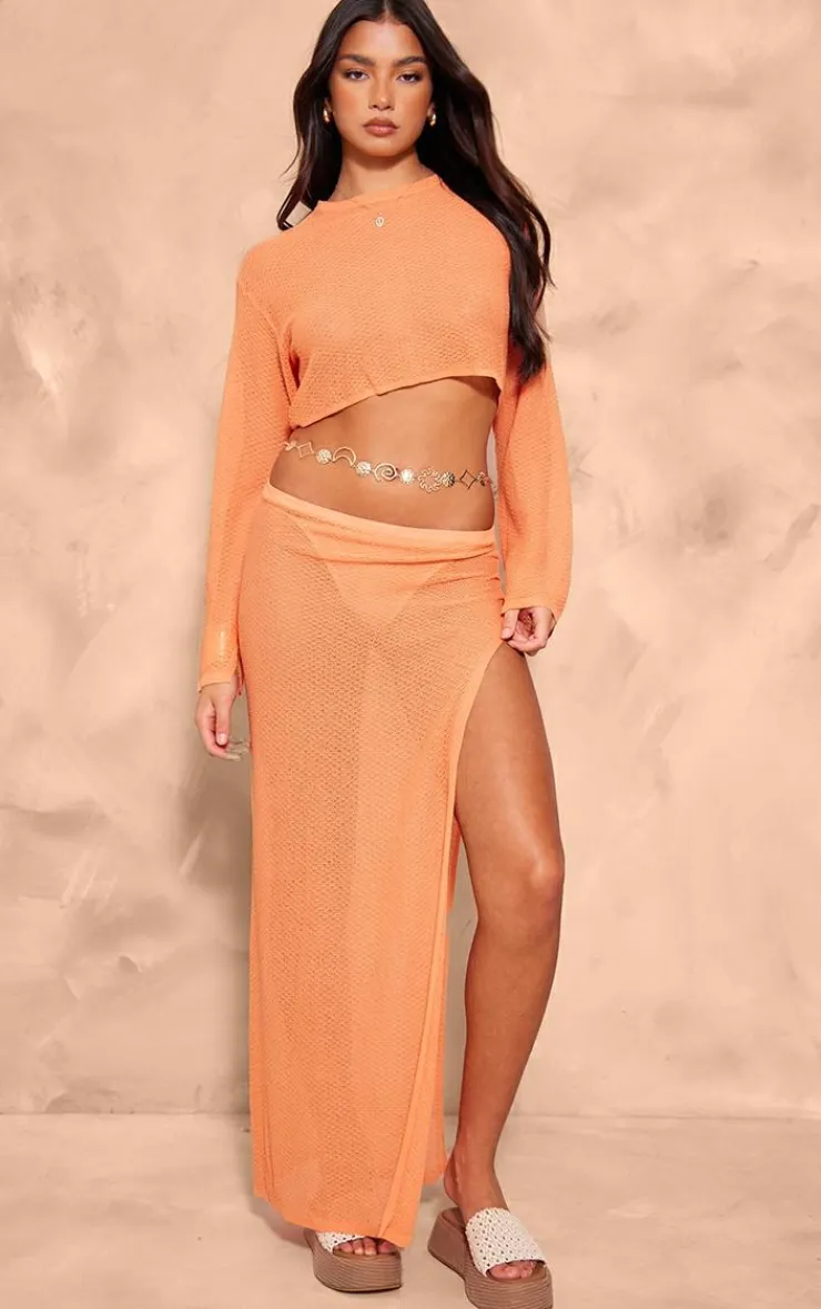 Online PrettyLittleThing Textured Sheer Knit Floaty Long Sleeve Crop Top Orange