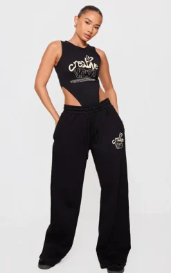 Hot PrettyLittleThing Petite Graphic Detail Wide Leg Sweatpants Black