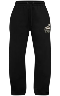 Hot PrettyLittleThing Petite Graphic Detail Wide Leg Sweatpants Black
