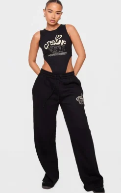 Online PrettyLittleThing Petite Graphic Detail High Cut Bodysuit Black