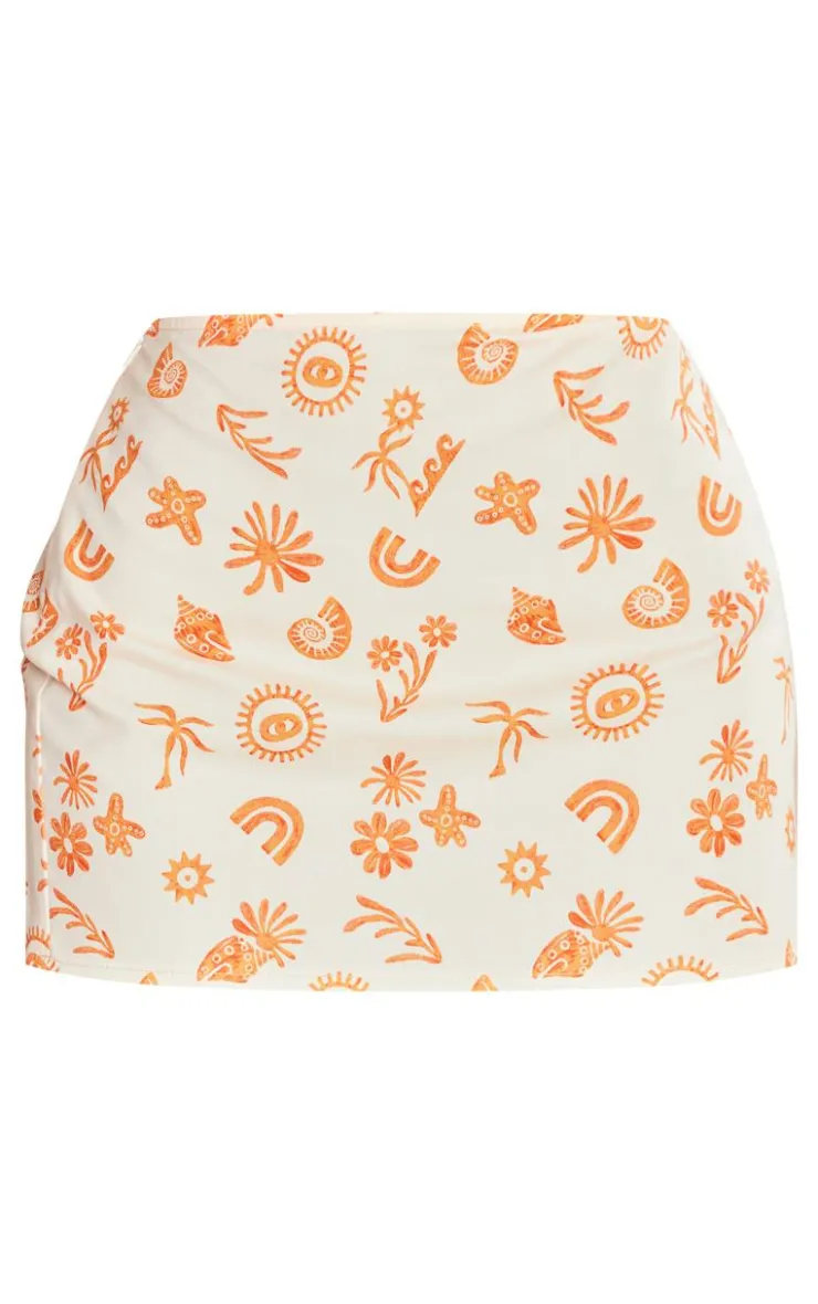 Online PrettyLittleThing Petite Printed Low Rise Mini Skirt Orange