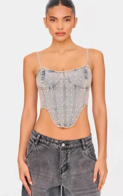 PrettyLittleThing Corsets*Pink Tint Diamante Detail Curved Hem Denim Corset Top