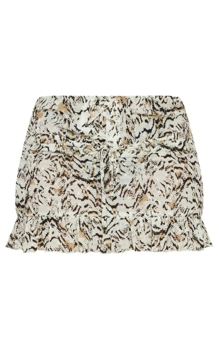 Online PrettyLittleThing Plus Leopard Lace Up Ruffle Hem Skirt Cream
