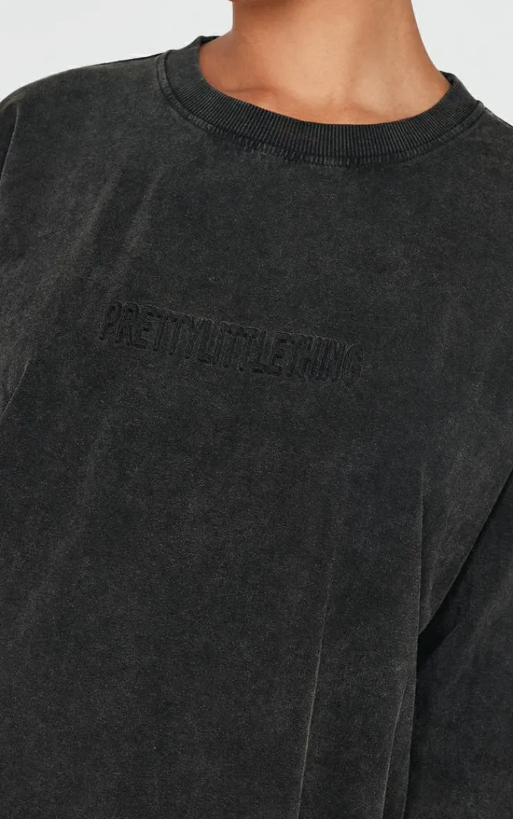 PrettyLittleThing Embossed Logo Washed Long Sleeve T-shirt Black