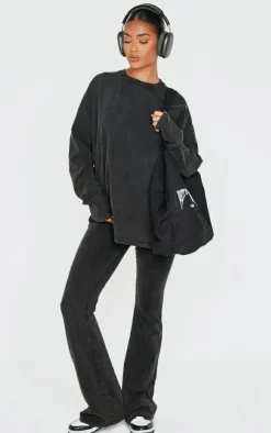 PrettyLittleThing Embossed Logo Washed Skinny Flare Pants Black