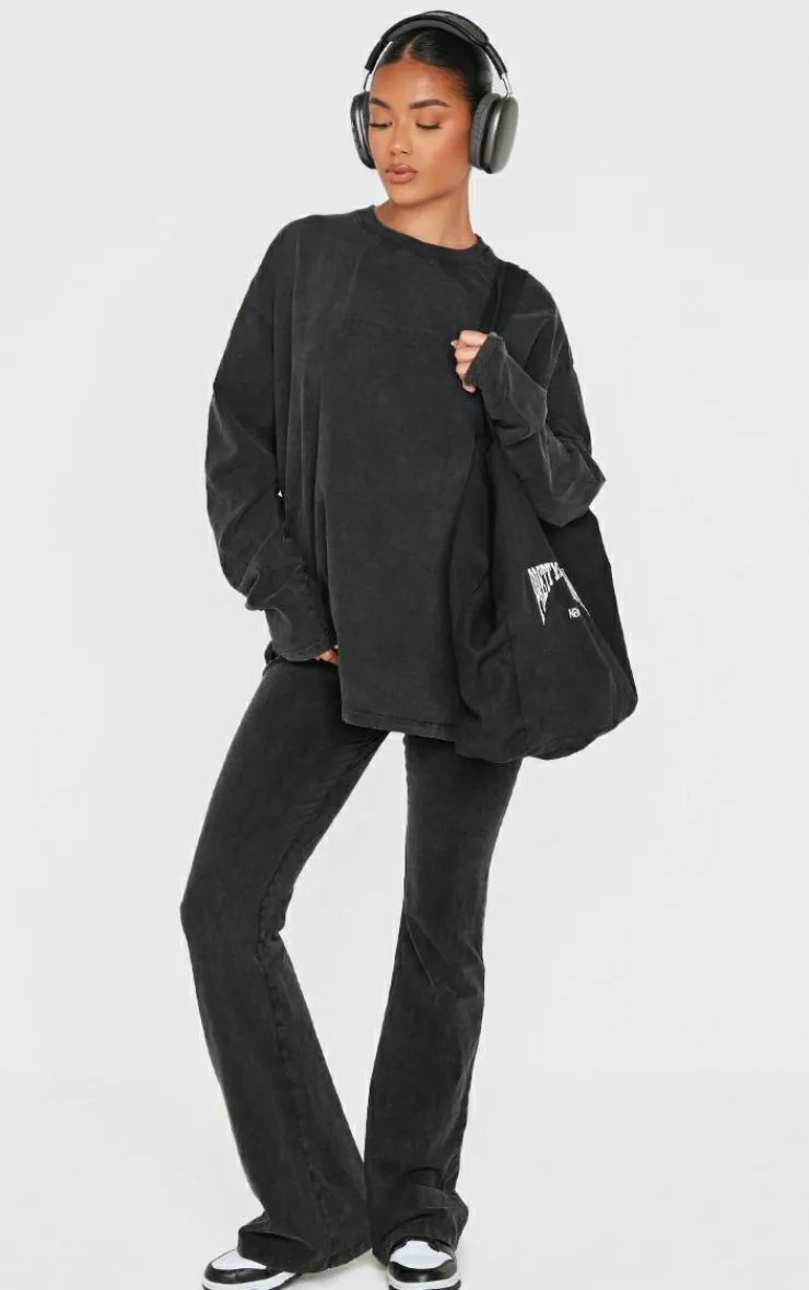 PrettyLittleThing Embossed Logo Washed Skinny Flare Pants Black