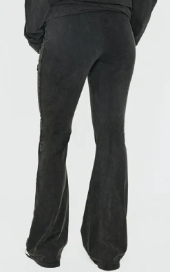 PrettyLittleThing Embossed Logo Washed Skinny Flare Pants Black