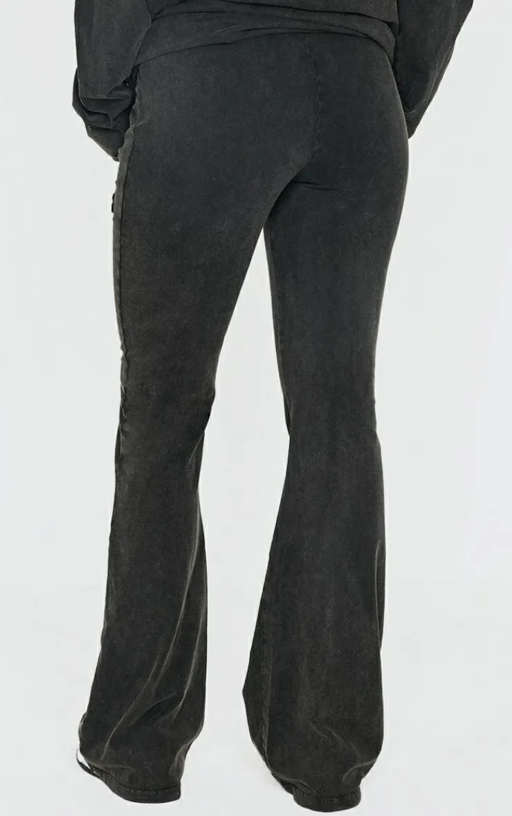 PrettyLittleThing Embossed Logo Washed Skinny Flare Pants Black