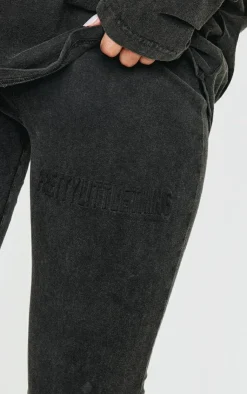PrettyLittleThing Embossed Logo Washed Skinny Flare Pants Black