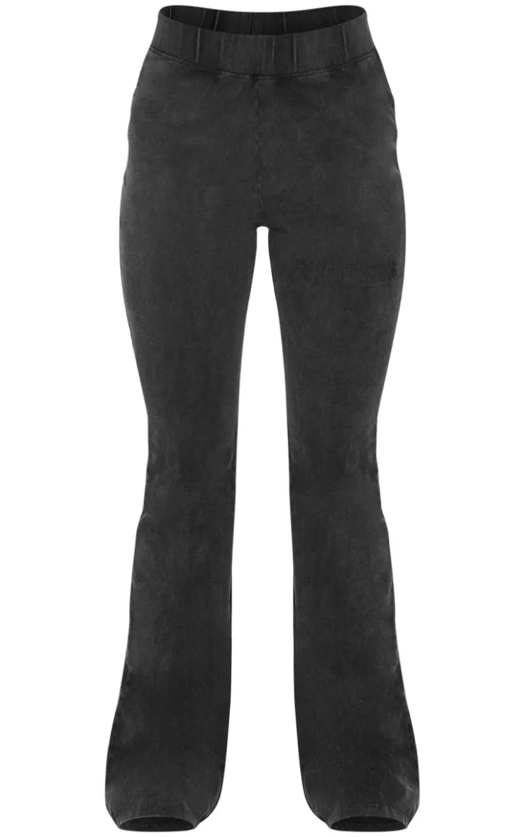 PrettyLittleThing Embossed Logo Washed Skinny Flare Pants Black