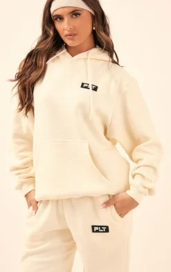 PrettyLittleThing Cream Sweatsuits*Logo Badge Detail Straight Leg Sweatpants