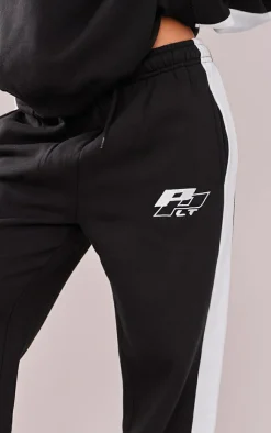 PrettyLittleThing Black Sweatsuits*Petite Embroidered Side Panel Detail Straight Leg Sweatpants