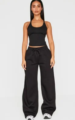 PrettyLittleThing Petite Embroidered Wide Leg Sweatpants Black
