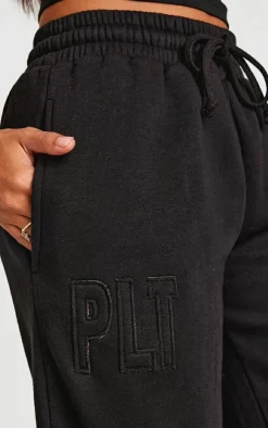 PrettyLittleThing Petite Embroidered Wide Leg Sweatpants Black