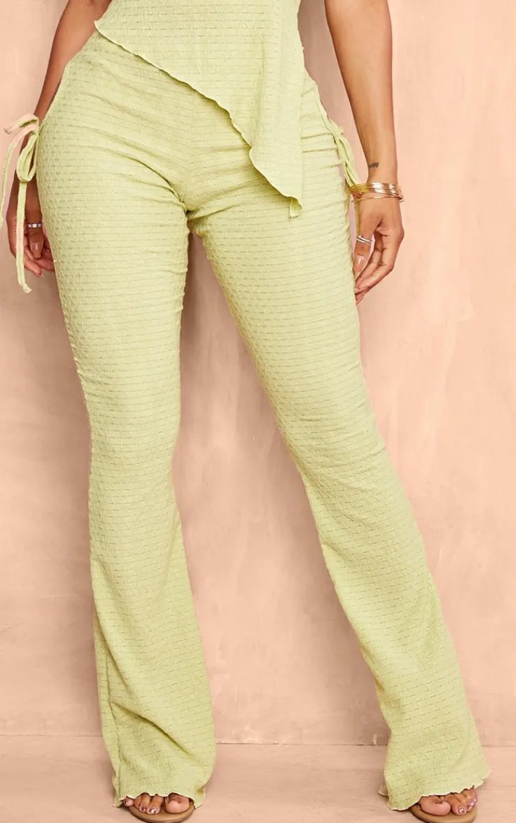New PrettyLittleThing Shape Textured Cut Out Flare Pants Sage Green