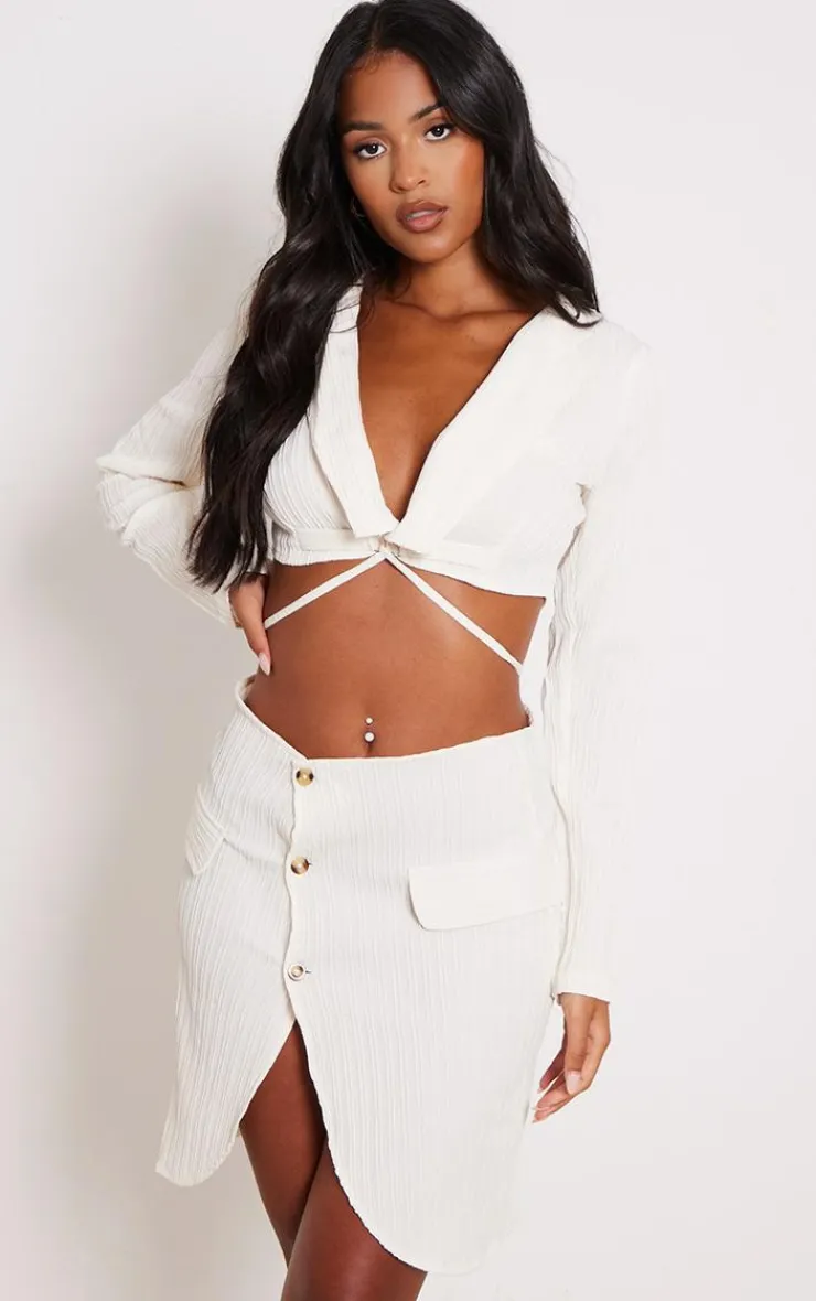 Online PrettyLittleThing Tall Textured Button Front Mini Skirt Beige